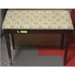 A VINTAGE PIANO STOOL