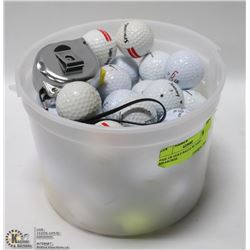 PAIL OF GOLF BALLS W/ TAPE MEASURER