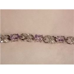 BRACELET - 12 OVAL FACETED PURPLE AMETHYST GEMSTONES & DIAMOND IN STERLING SILVER CROSSOVER LINK DES