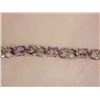 Image 1 : BRACELET - 12 OVAL FACETED PURPLE AMETHYST GEMSTONES & DIAMOND IN STERLING SILVER CROSSOVER LINK DES