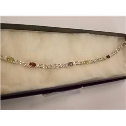 BRACELET - MULTI-GEMSTONE & DIAMOND IN STERLING SILVER SETTING - 9 OVAL FACETED GEMS - ESTIMATED RET