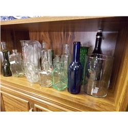 SHELF OF COLLECTIBLE BOTTLES