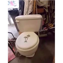 TOILET WITH PADDED SEAT