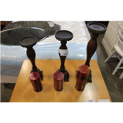 THREE CANDLESTANDS AND CANDLES