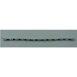 6.05CT SAPPHIRE + DIAMOND TENNIS BRACELET. FIGURE 8 LINKS. 12 OVAL SAPPHIRES. INCLUDES $550