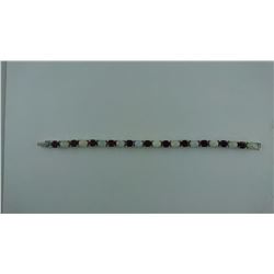 26.24CT FIRE OPAL/ GARNET BRACELET SUGGESTED RETAIL PRICE $930