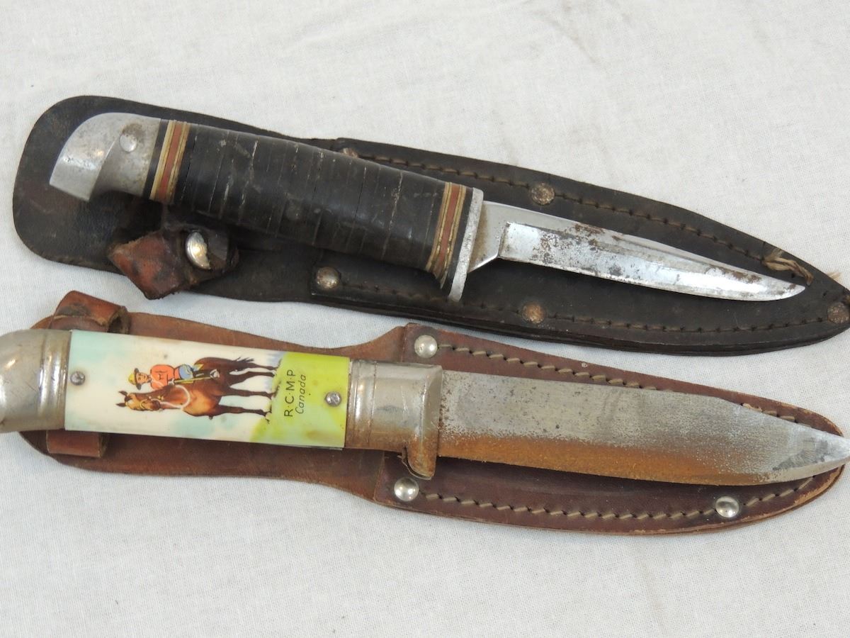 2 Knives with cases (1 marked RCMP Canada)
