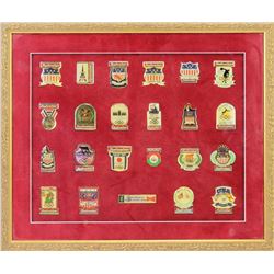 Frame of 25 Budweiser Olympic pins, all reproduction, Munich, Moscow, Athens and more, all nicely fr