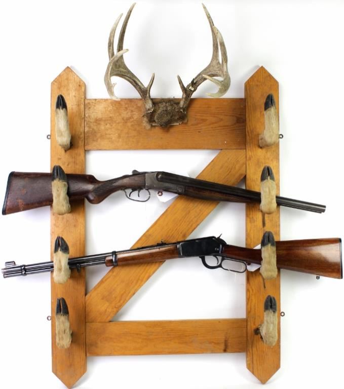 Vintage deer hoof gun rack, mounted antler holding 4 individual guns