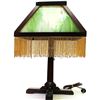 Image 1 : Mission Arts & Craft period table lamp with four panel green glass shade and beaded fringe, 22" tall