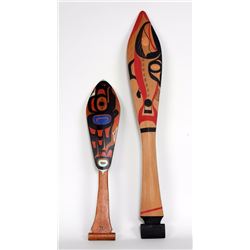 Kwaguilth Dance Paddle with Painted Design by George Hunt 32 1/2" L. 5" W. and a Haida Dance Paddle 