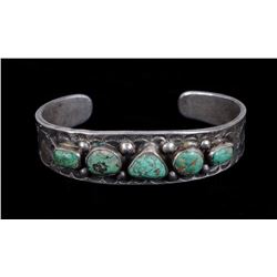 Navajo Silver and Green Turquoise Bracelet with Stamped Design 62 GMS 6" L. 3/4" W. 1 1/4" W. Gap  G