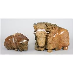 Two Inuit Soapstone Carvings of a Musk Ox Signed Iyak12" L. 8 1/2" H. and 9" L. 5 1/2" W.  Both in G