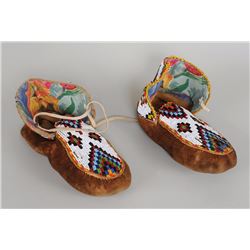 Pair of Plains Beaded Moccasins with Geometric Design 9" L.  Good Condition with Bead Loss