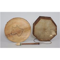 Two Drums, One with Painted Design 14" W. and 13 1/2" W.  Both in Good Condition