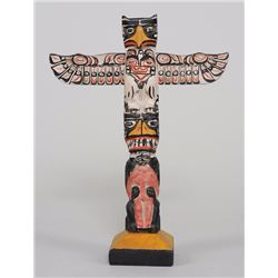 Northwest Coast Totem Carved with Thunderbird and Bear Holding Human 8" H. 6" W.  Good Condition