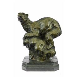 decorative heavy bronze sculpture on marble base