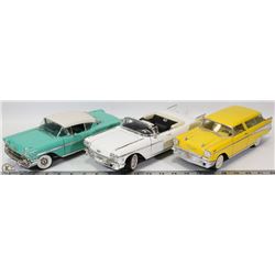 LOT OF THREE 1:18 SCALE DIE CAST INCL 1957 CHEVY,