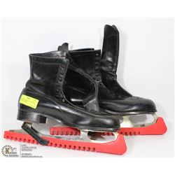 A PAIR OF ANTIQUE J. C. HIGGINS LEATHER SKATES