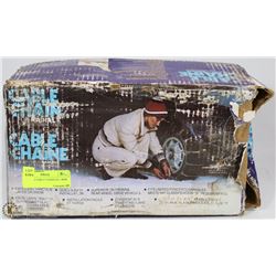 A PAIR OF CABLE CHAINS IN A BOX