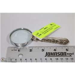 VINTAGE MAGNIFYING GLASS FROM AN OLD SILVER