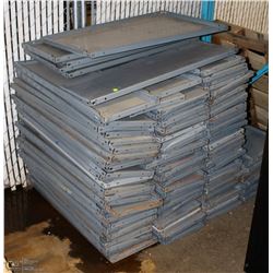 STACK OF METAL SHELVES