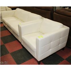 WHITE LEATHERETTE SHOWHOME COUCH WITH 1 CHAIR.
