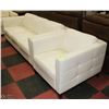 Image 1 : WHITE LEATHERETTE SHOWHOME COUCH WITH 1 CHAIR.