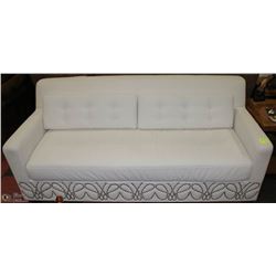 SHOWHOME WHITE LEATHERETTE DESIGNER NAILHEAD SOFA
