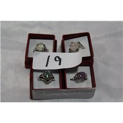 FOUR LADIES RINGS WITH STONES