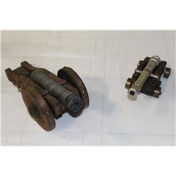 TWO DECORATIVE CANONS