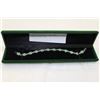 Image 1 : STERLING EMERALD AND RUBY TENNIS BRACELET