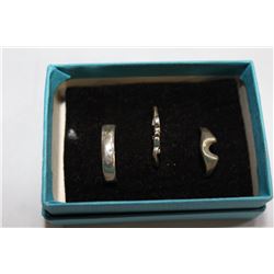 THREE STERLING RINGS