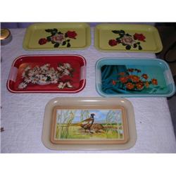 five old tin trays