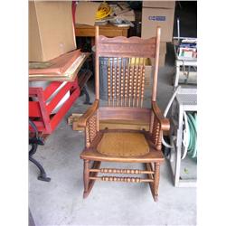 Antique carved rocking chair