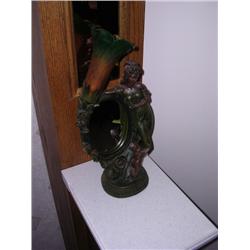 Bronze lady light with an oval mirror
