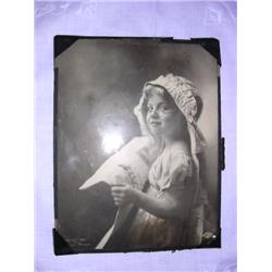 Picture of young girl w/reading glasses