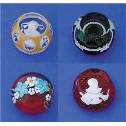 FOUR PAPERWEIGHTS
