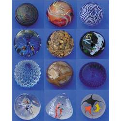 TWELVE ART GLASS PAPERWEIGHTS