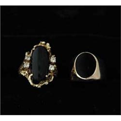 TWO GOLD & ONYX RINGS