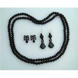 FOUR PIECES OF JET JEWELRY