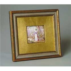 PAIR OF FRAMED ENAMELED PLAQUES