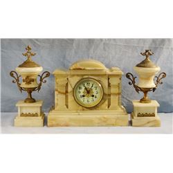 E. Keller marble mantle clock w/matching candle stick holders, brass trim