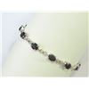 Image 1 : BRACELET - 11CTW OVAL FACETED GARNETS (11)  IN STERLING SILVER SETTING - WITH CERTIFICATE $789