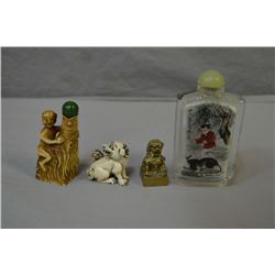 Selection of Oriental collectibles including an elephant ivory foo dog netsuke, a reverse painted gl