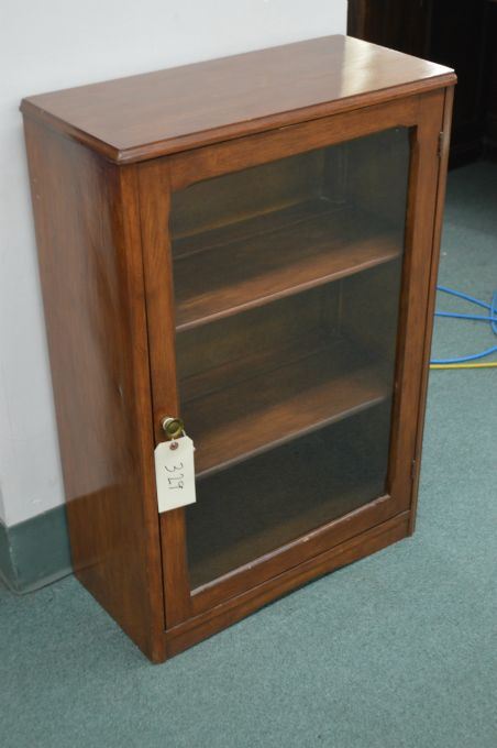 Small Single Door Book Storage Cabinet With Three Shelves And Glazed Door