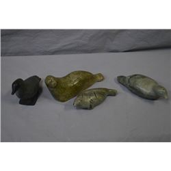 Four small carved soapstones including two birds and two seals, some with signatures and both birds 