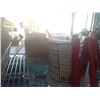 Image 1 : PLASTIC SPOONS AND RED TONGS IN BIN