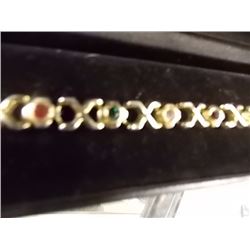GOLD BRACELET WITH STONES
