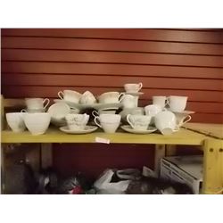 TEA CUPS AND SAUCERS